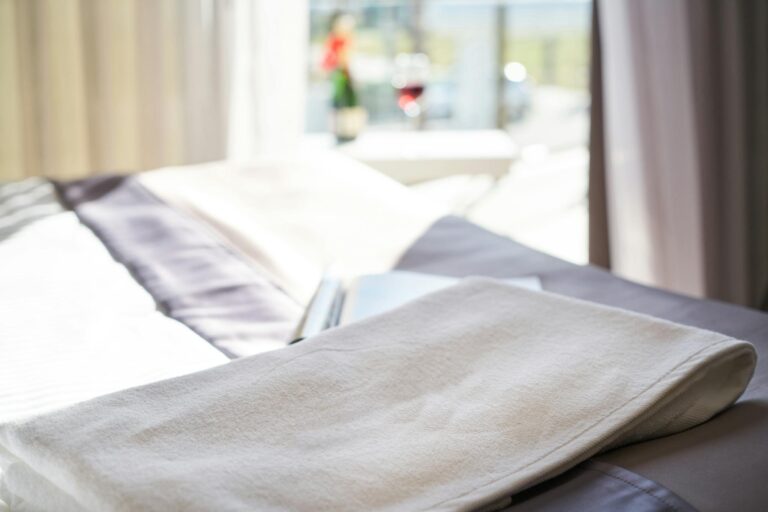 White Towel on Bed